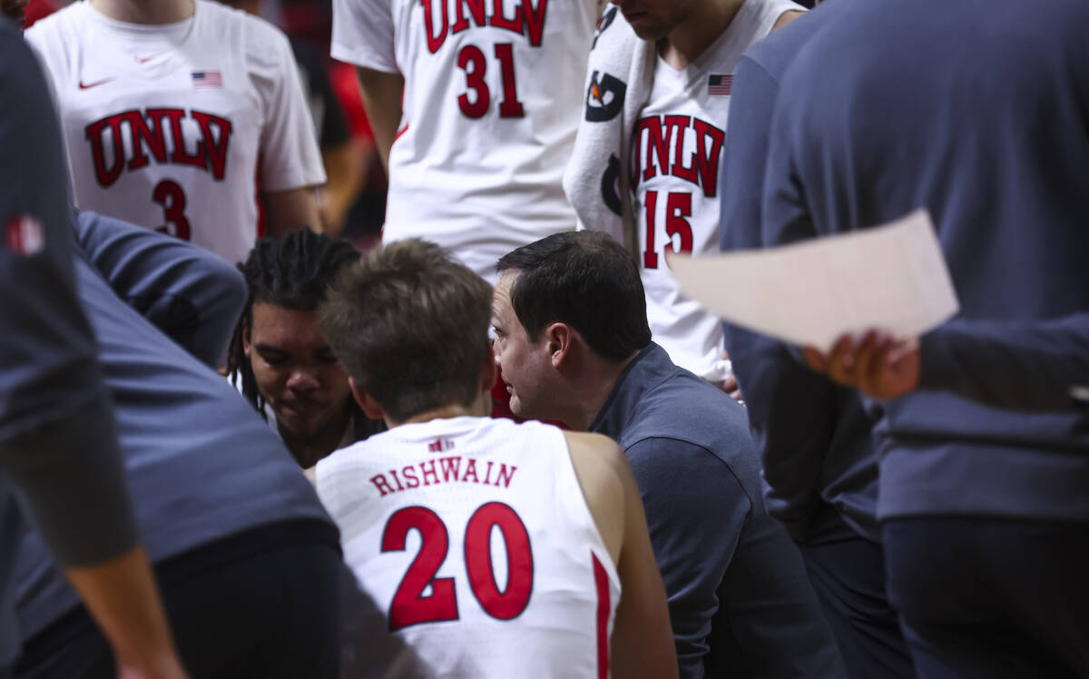 UNLV Rebels head coach Kevin Kruger talks to his players during the second half of a basketball ...