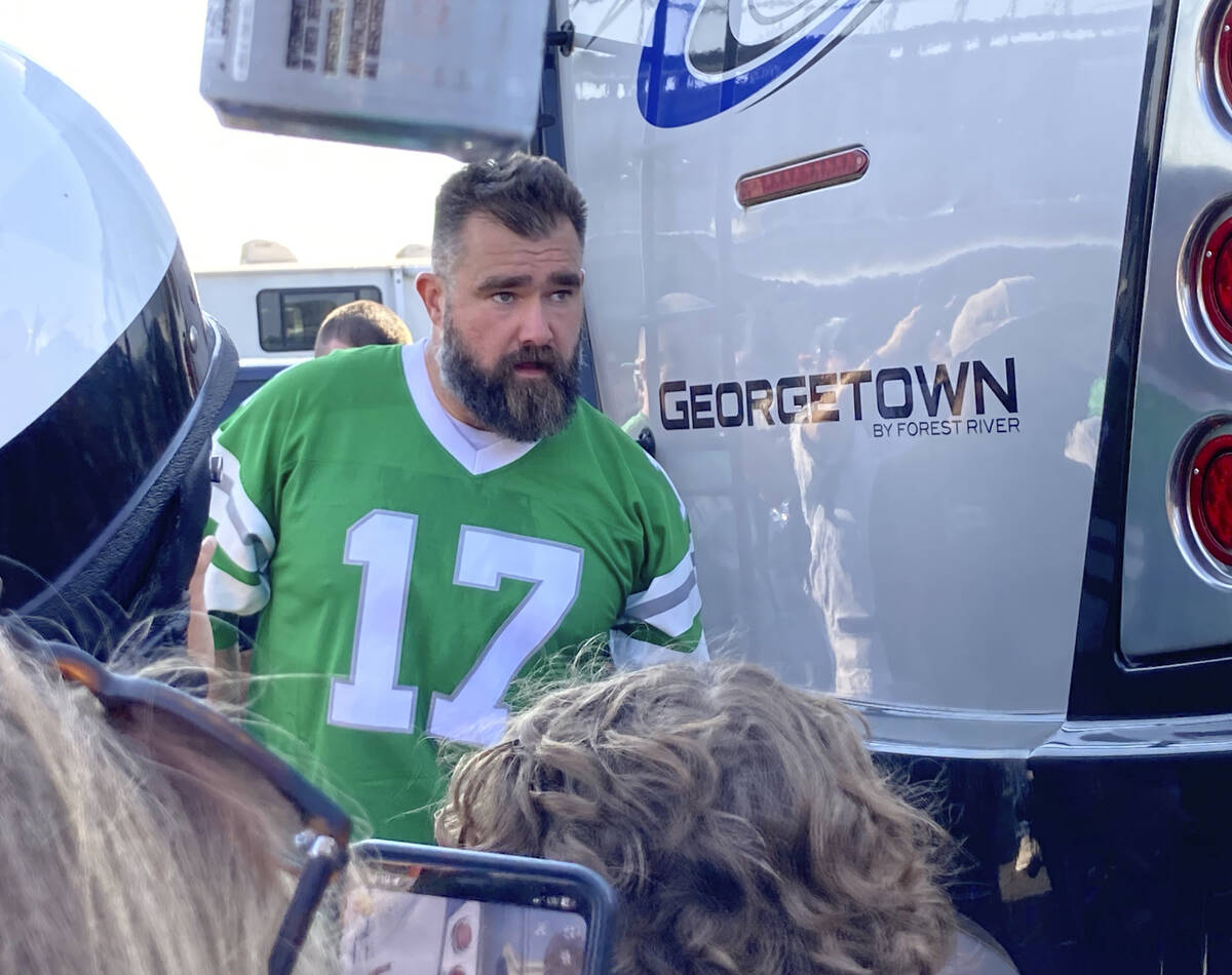 Retired Philadelphia Eagles center Jason Kelce waits to suprise fans at an impromptu appearance ...