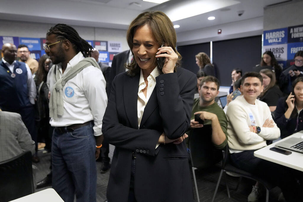 Democratic presidential nominee Vice President Kamala Harris phone banks with volunteers at the ...