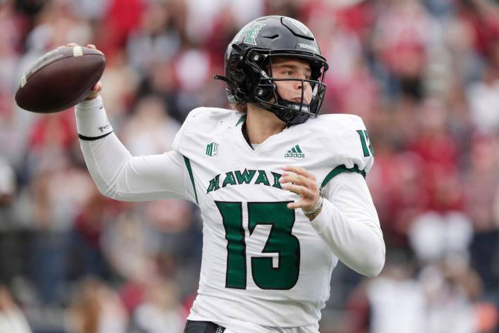 Hawaii quarterback Brayden Schager (13) throws a pass during the second half of an NCAA college ...