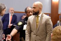 Metropolitan Police Department Sgt. Kevin Menon leaves a courtroom after his bail hearing at th ...