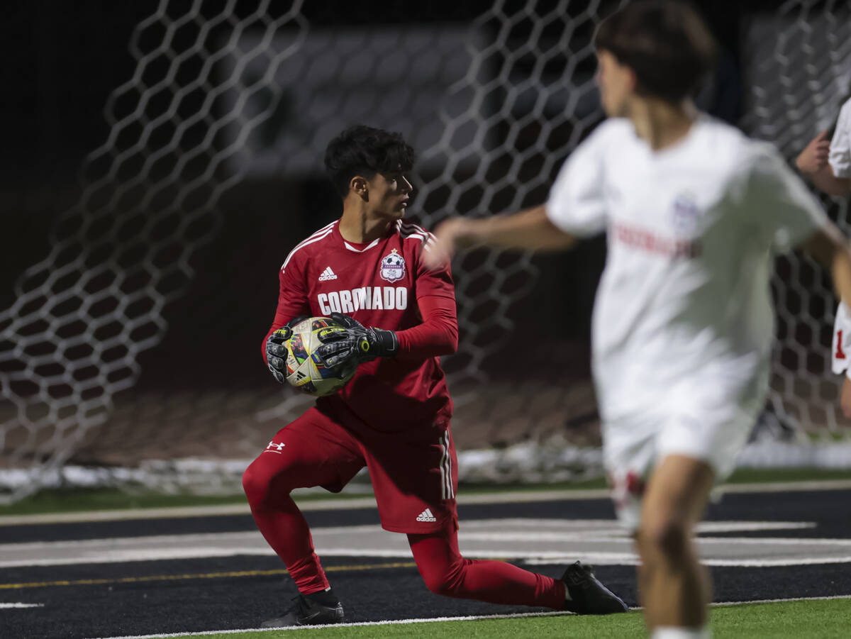 Coronado's goalkeeper Logan Pierce looks on after making a stop during a soccer game at Palo Ve ...