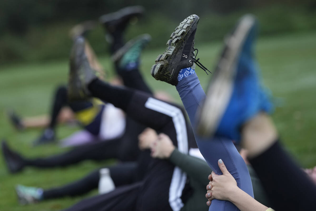 A participants takes part in an outdoor gym class led by personal fitness trainer Richard Lamb, ...