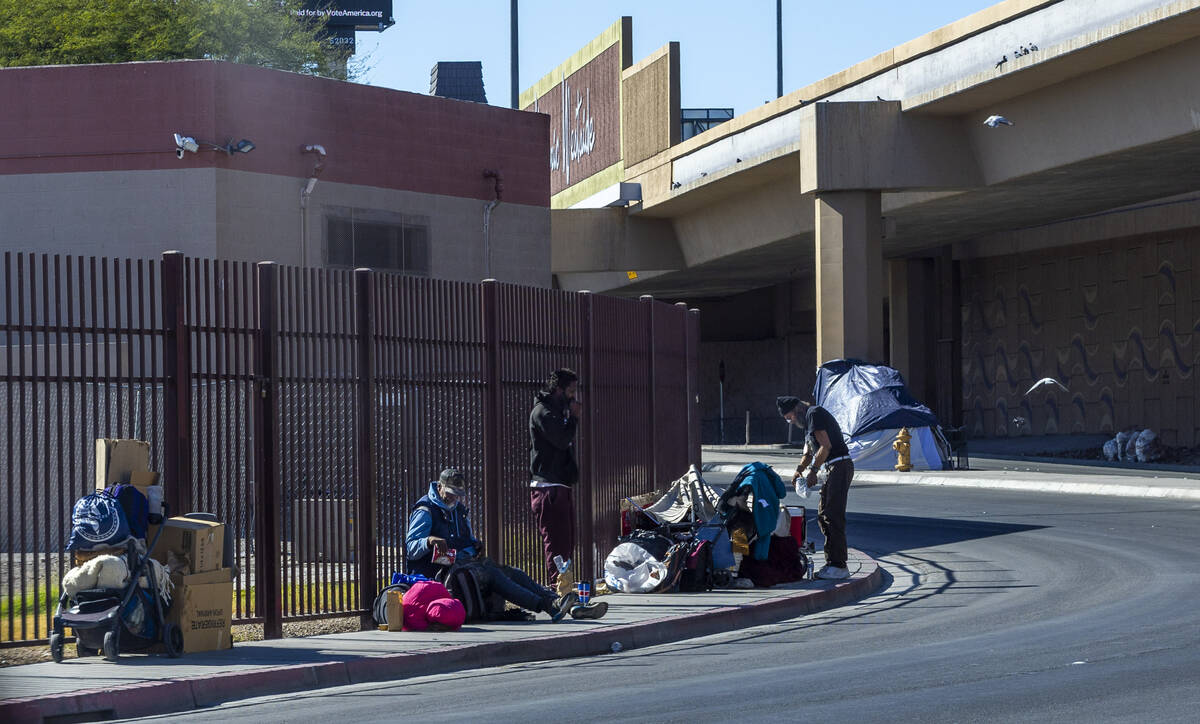 Homeless campers claim spots on the sidewalk along West Wilson Avenue on Wednesday, Nov. 6, 202 ...