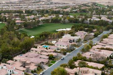 Luxury homes along Southern Highlands Golf Course are shown in Southern Highlands, on Tuesday, ...