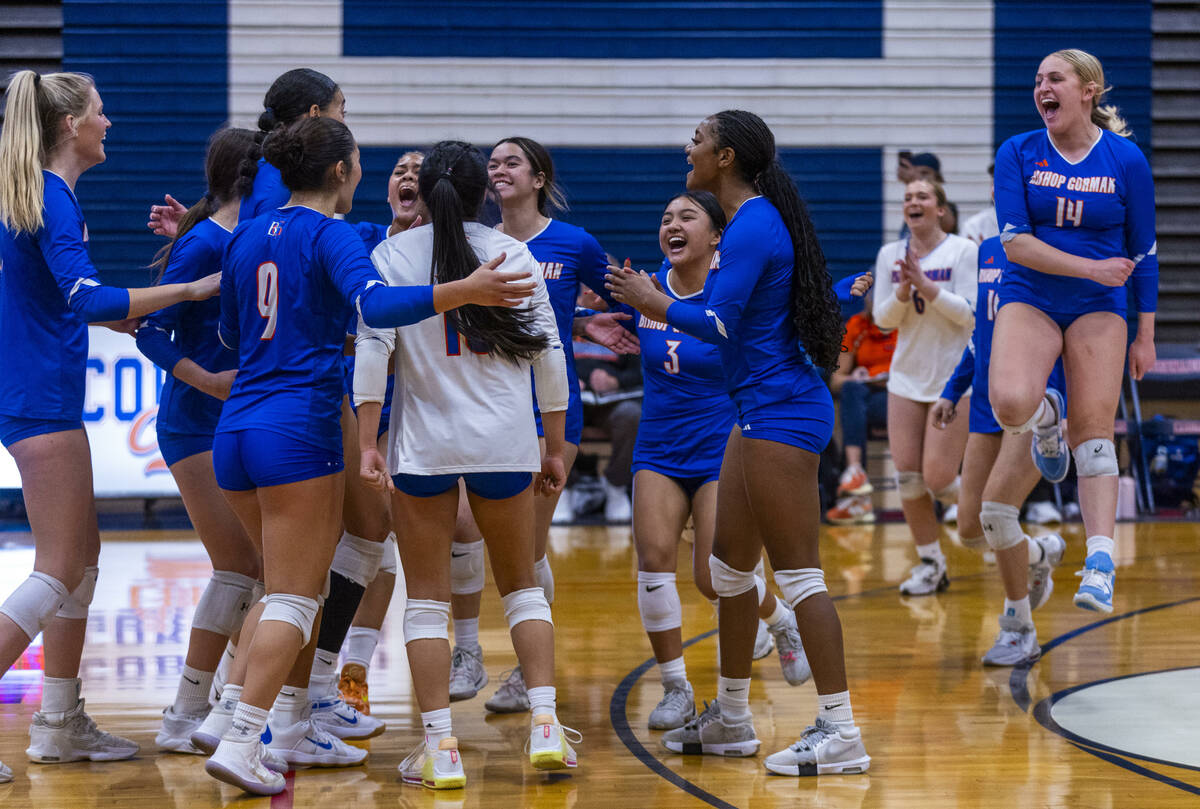 Bishop Gorman players celebrate as the final point is won against Coronado in their Class 5A gi ...