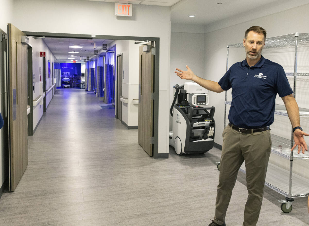 Chris Loftus, CEO of West Henderson Hospital, leads a tour of the new hospital, on Friday, Nov. ...