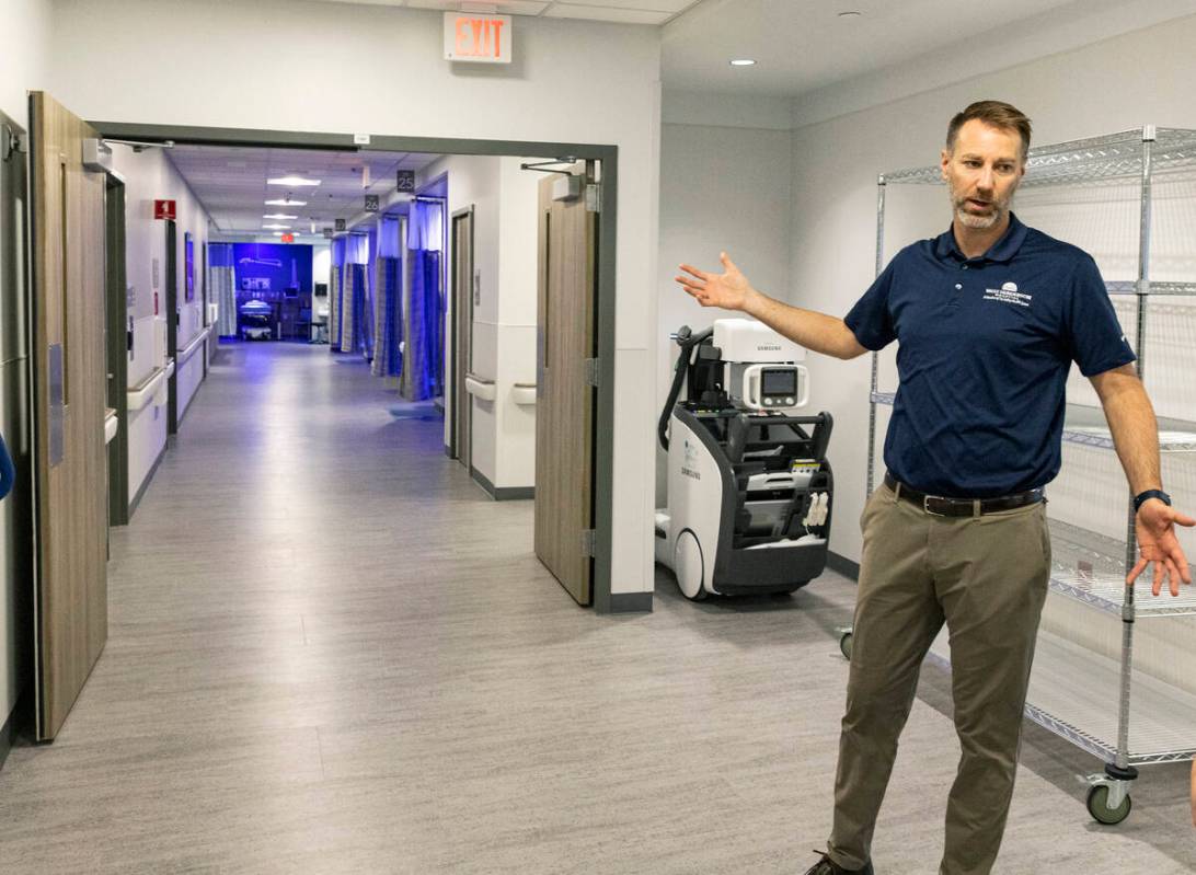 Chris Loftus, CEO of West Henderson Hospital, leads a tour of the new hospital, on Friday, Nov. ...