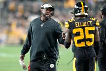 Pittsburgh Steelers head coach Mike Tomlin talks to safety DeShon Elliott (25) during the first ...