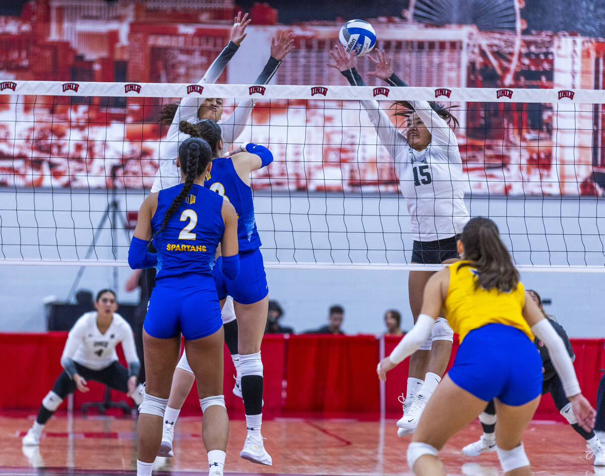 UNLV outside hitter Alondra Alarcon (15) elevates while attempting to block a shot by San Jose ...