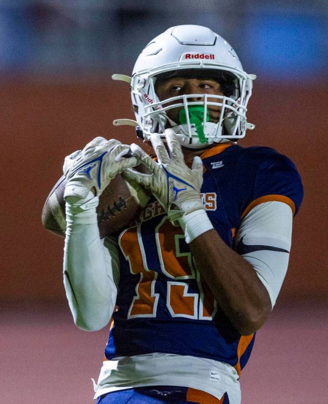 Legacy wide receiver Dejuan Robinson (19) secures a touchdown catch against Shadow Ridge during ...