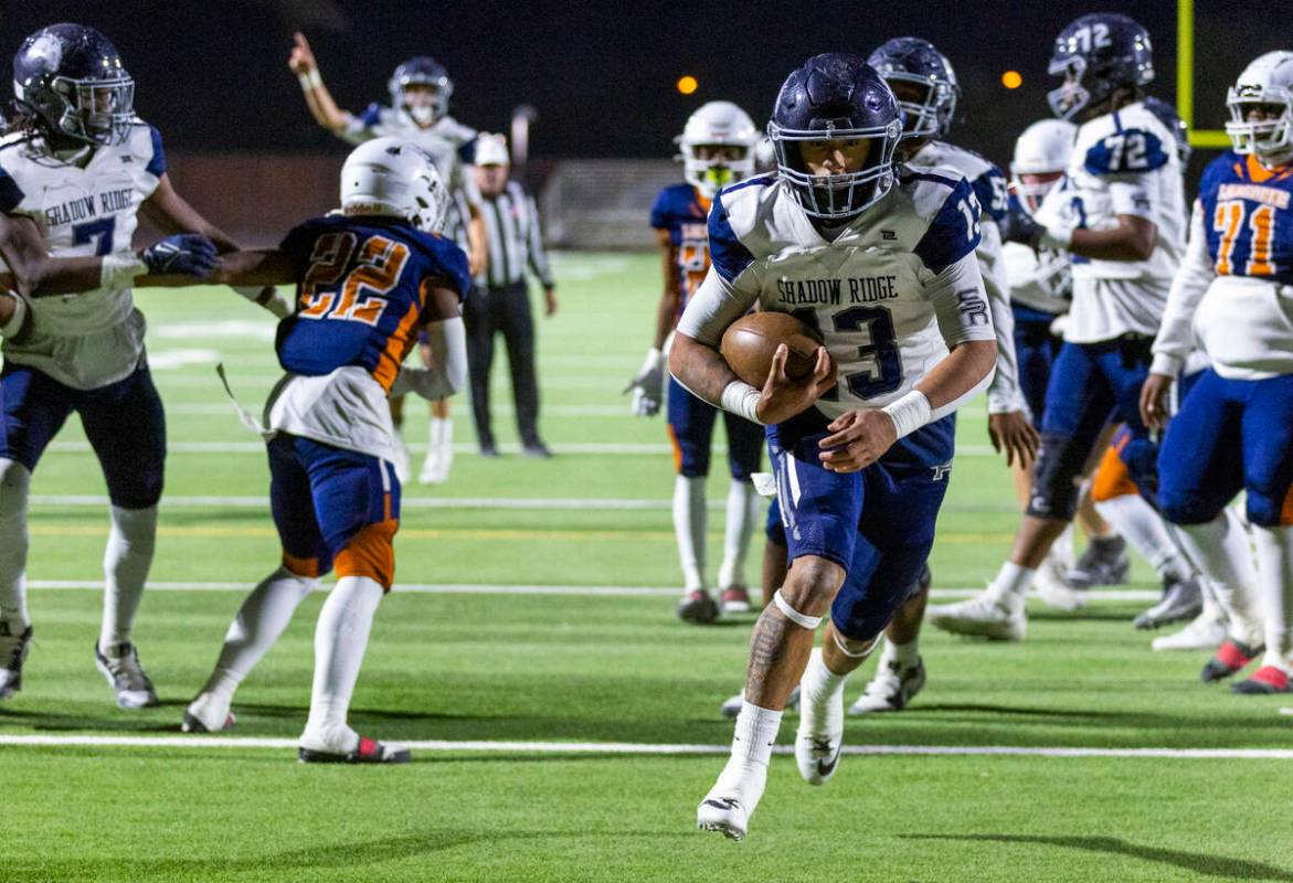 Shadow Ridge fullback Malahkai Berry (13) scores up the middle against Legacy during the first ...