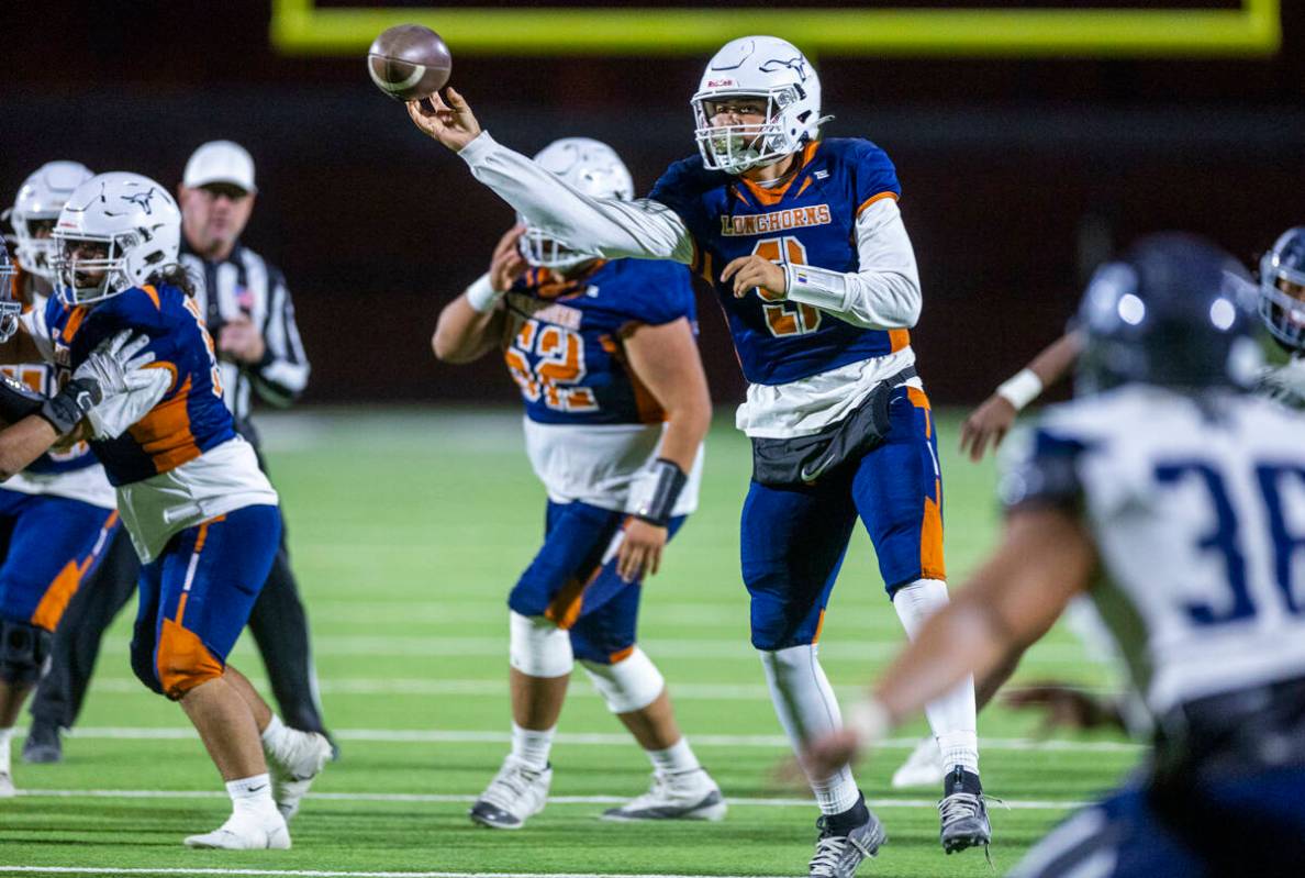 Legacy quarterback Aidan Crawford (9) slings a pass to a receiver against Shadow Ridge during t ...