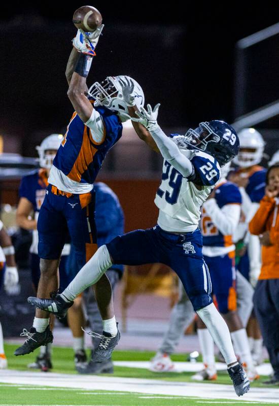 Legacy wide receiver Dominic Oliver (1) sis unable to secure a critical catch as Shadow Ridge d ...