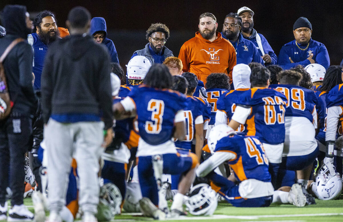 Legacy coaches console their players as they lose to Shadow Ridge following the second half of ...