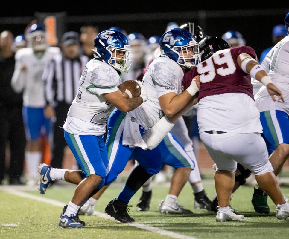 Green Valley running back Cris Dalina (22) runs with the ball during the 5A Division II Souther ...