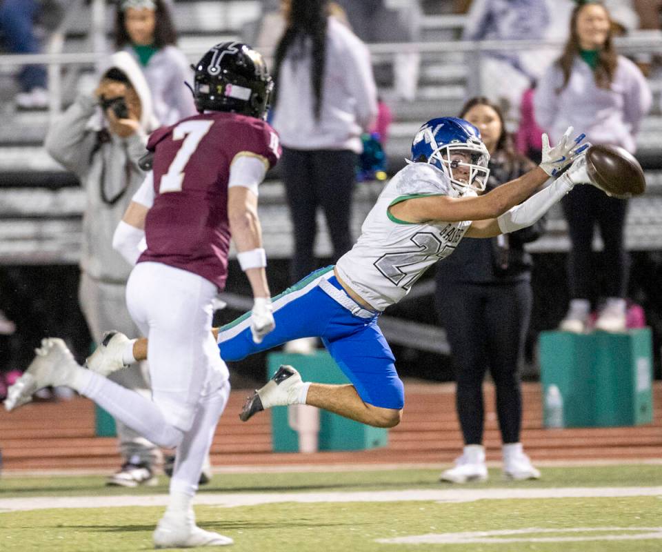 Green Valley sophomore Sonny Uranich (27) dives for a pass a barely misses during the 5A Divisi ...