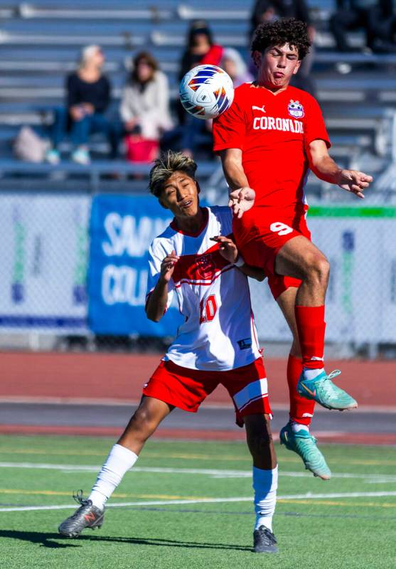 Coronado striker Dylan Flores (9) gets over Wooster midfielder Brandon Carreto Gomez (10) to se ...