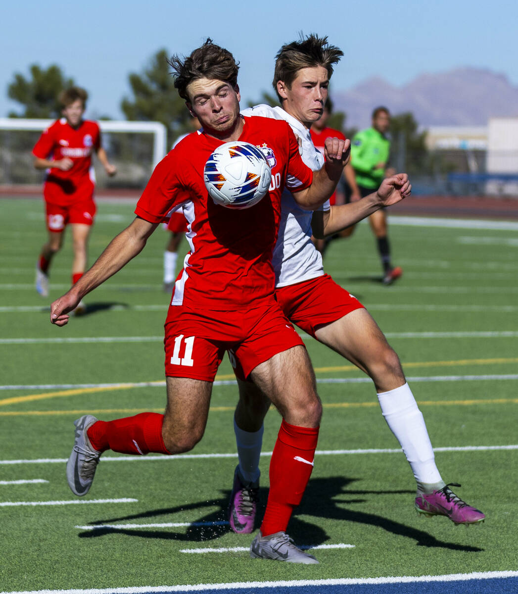 Coronado striker Gavin Flickinger (11) battles past Wooster defender Christopher Noguera Aguirr ...