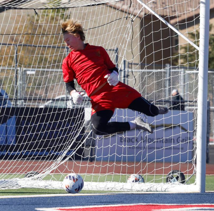 Palo Verde High's goalie Landon Blanchard leaps hafter blocking the ball during a Class 5A boy ...