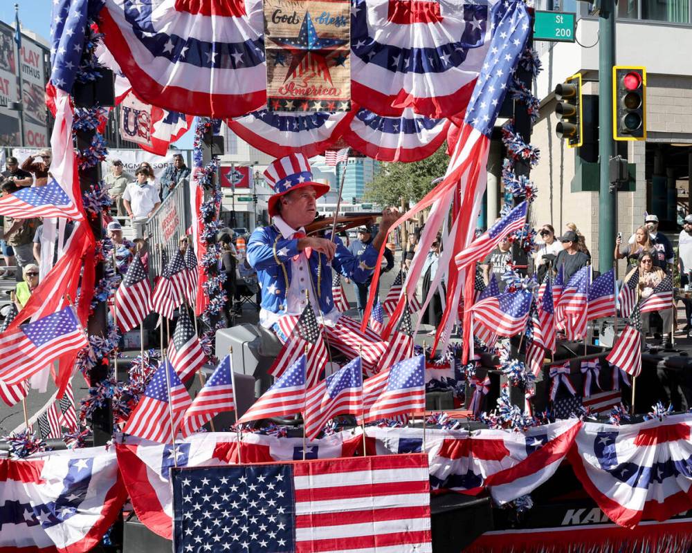 Americana Man patriotic music plays during the Las Vegas Veterans Day Parade downtown Monday, N ...