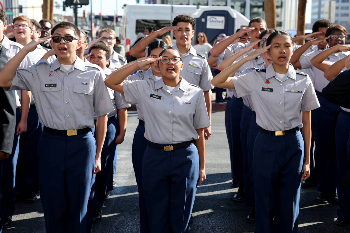 Valley High School Army JROTC salutes during the Las Vegas Veterans Day Parade downtown Monday, ...