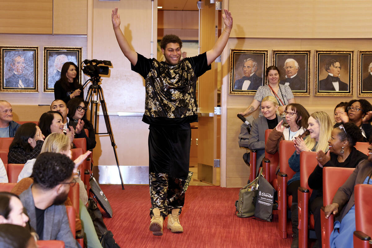 Formerly homeless youth Ali Wallace, 20, shows his fashion creation during the 8th Annual Nevad ...