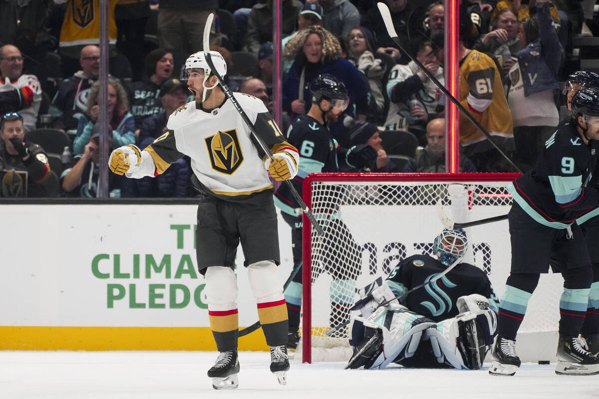 Vegas Golden Knights center Nicolas Roy reacts after scoring against Seattle Kraken goaltender ...