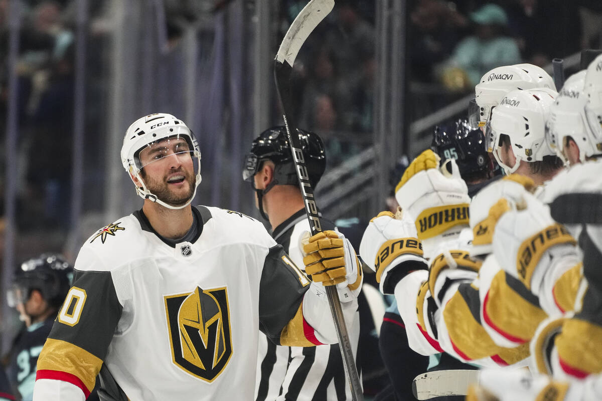 Vegas Golden Knights center Nicolas Roy greets teammates after scoring against the Seattle Krak ...