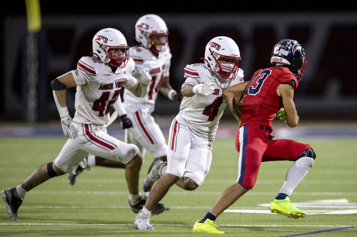 Arbor View senior Vicentico Pringle (4) looks to tackle Coronado wide receiver Scott "Bubb ...