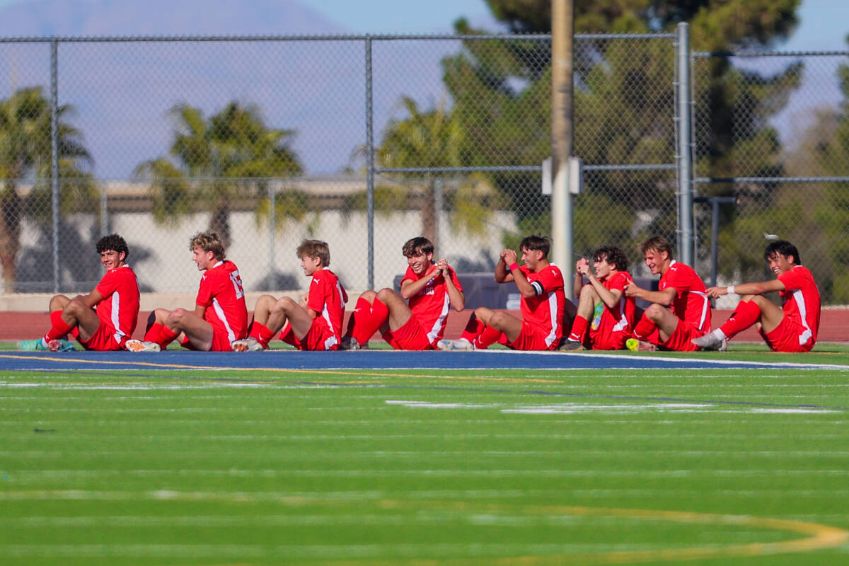 Coronado players celebrate a goal during a 5A boys soccer state championship match between Coro ...