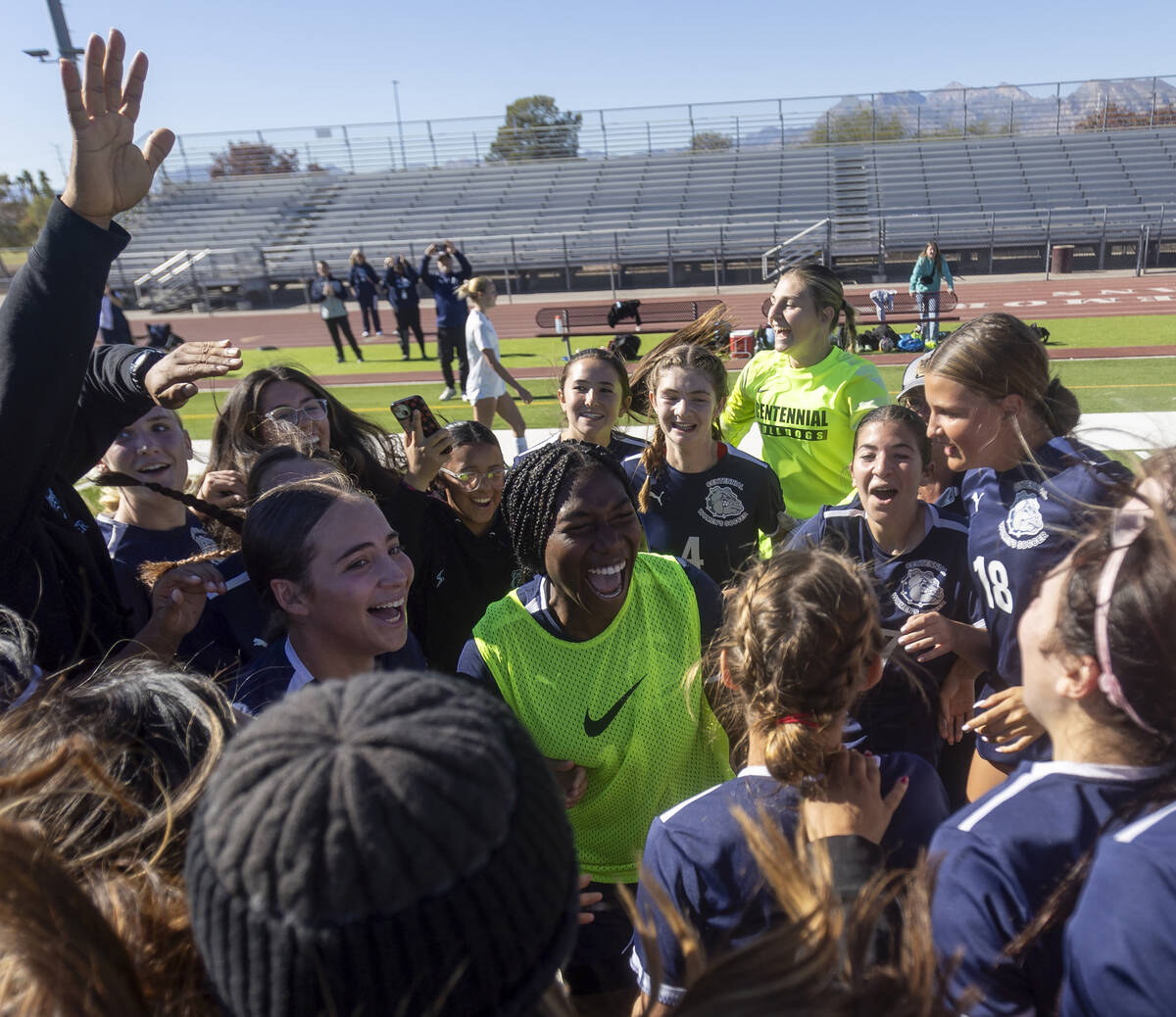 Centennial players celebrate winning the 4A girls soccer state title game 1-0 against Galena at ...