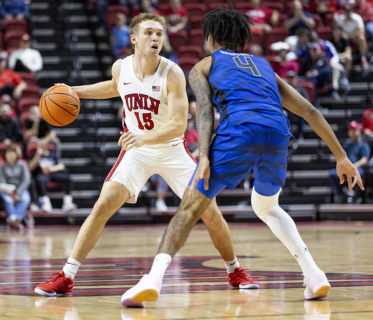 UNLV guard Jace Whiting (15) competes during the college basketball game against the Memphis Ti ...