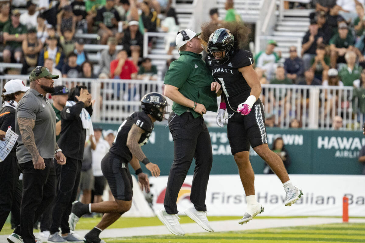 Hawaii defensive back Peter Manuma (1) celebrates after an interception during the first half o ...