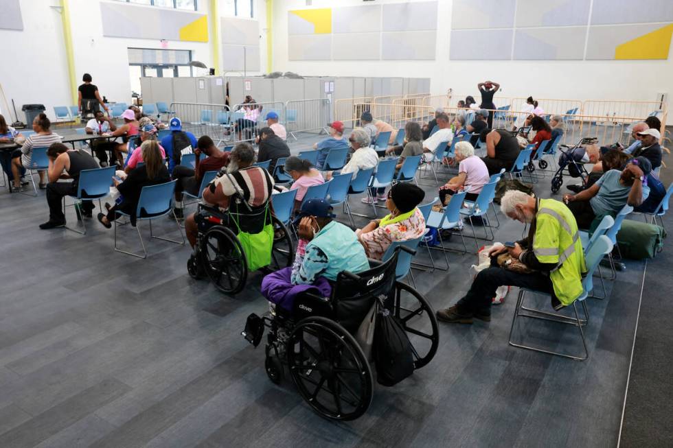 People beat the heat in a cooling station at the Courtyard Homeless Resource Center in Las Vega ...