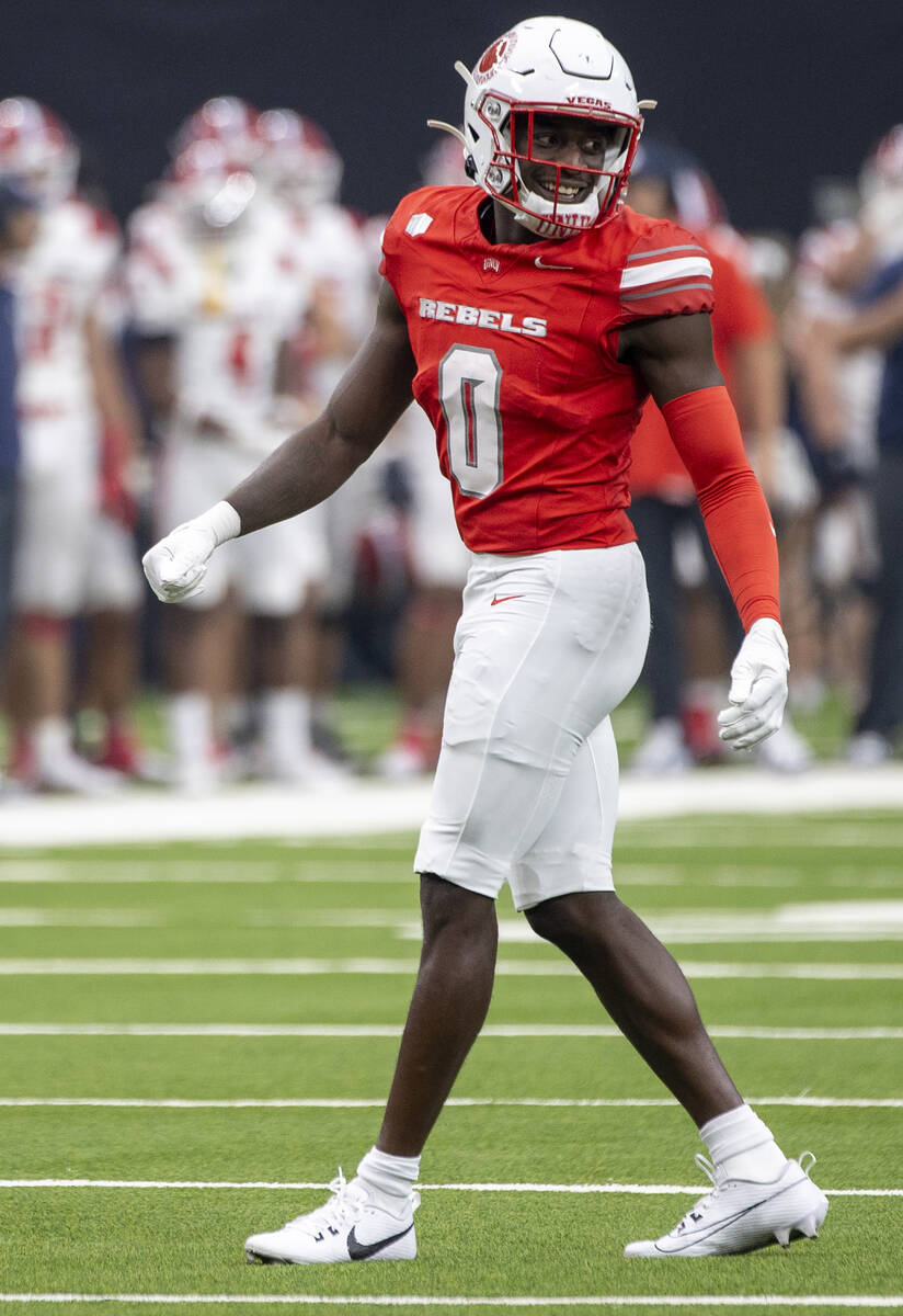 UNLV defensive back Tony Grimes (0) smiles during the college football game against Utah Tech a ...