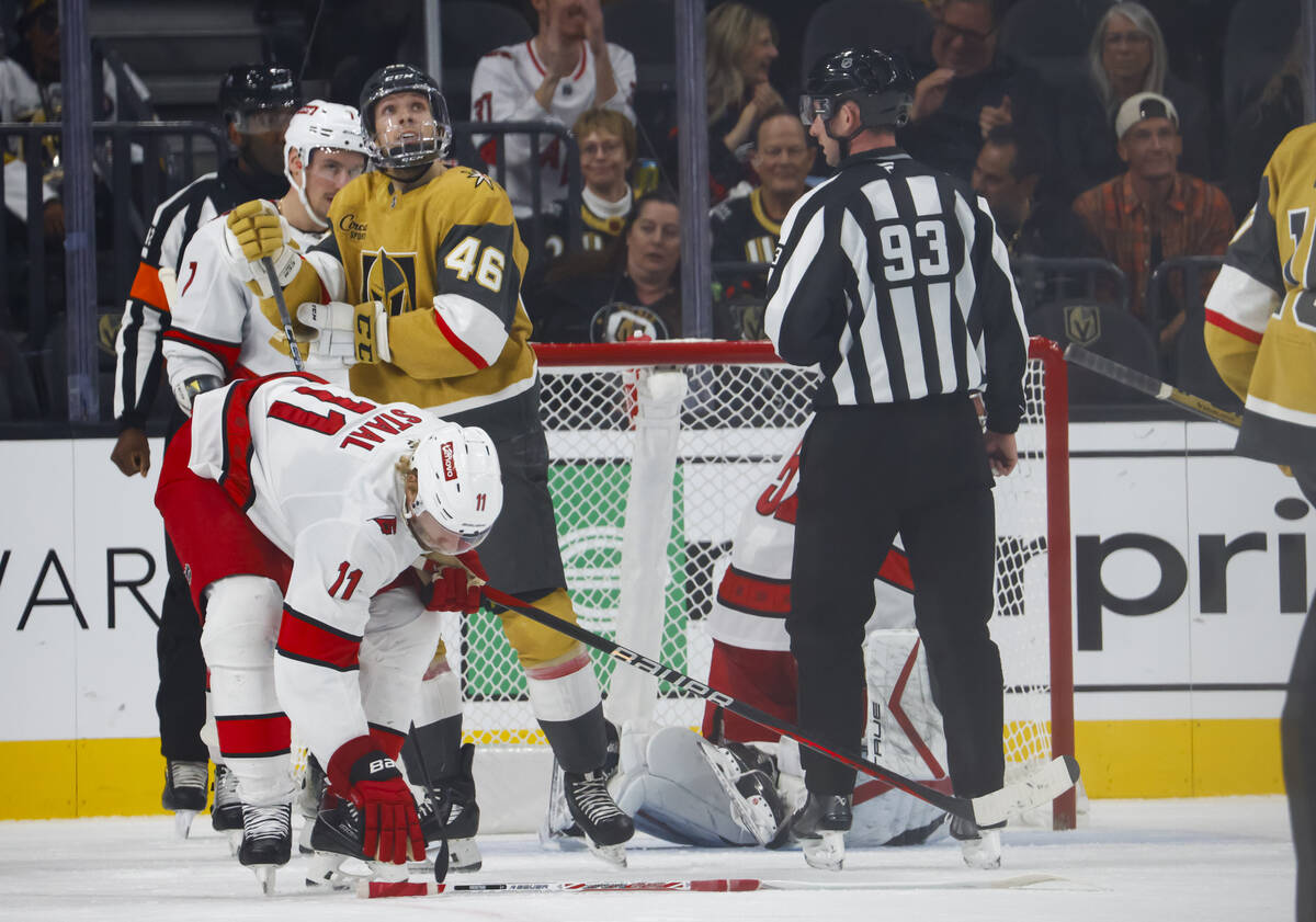 Golden Knights right wing Jonas Rondbjerg (46) looks on after Carolina Hurricanes goaltender Py ...