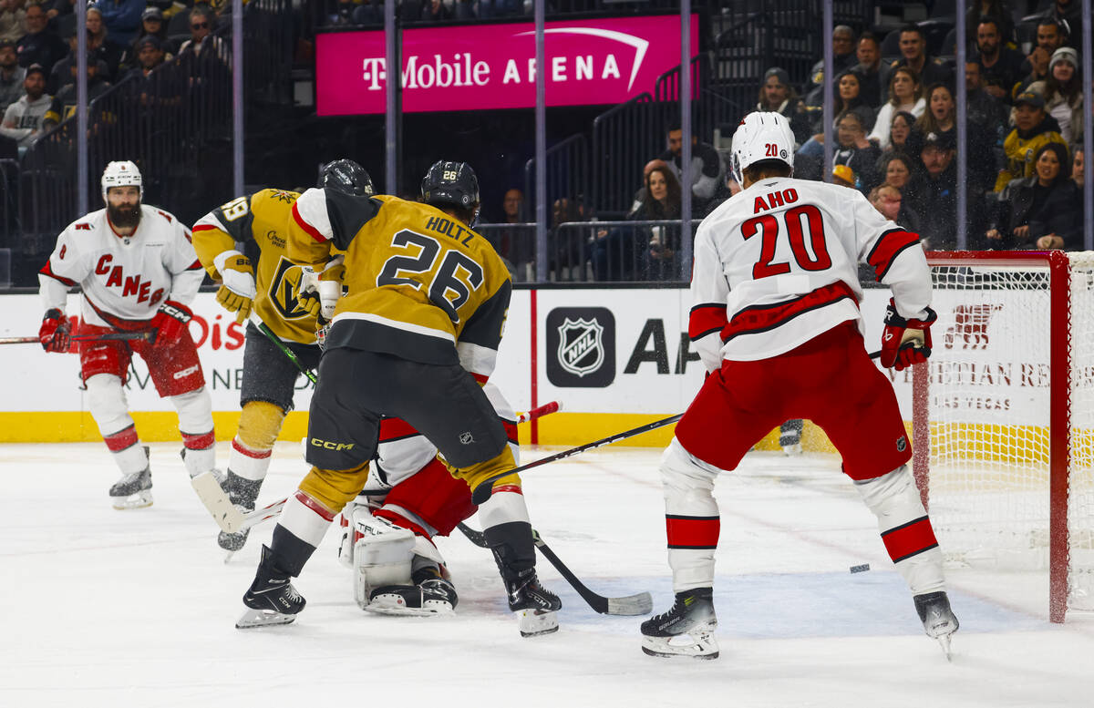 The Golden Knights score against the Carolina Hurricanes during the third period of an NHL hock ...