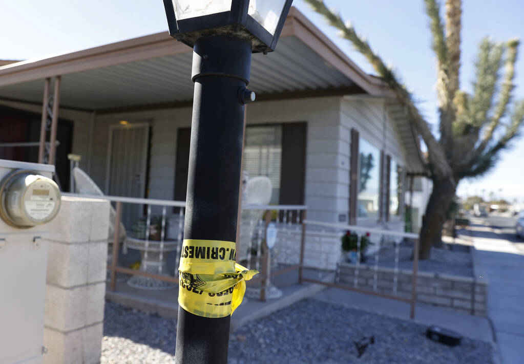 Crime scene tape is seen near the house where Monique Gilbertson's body was found, on Monday, N ...