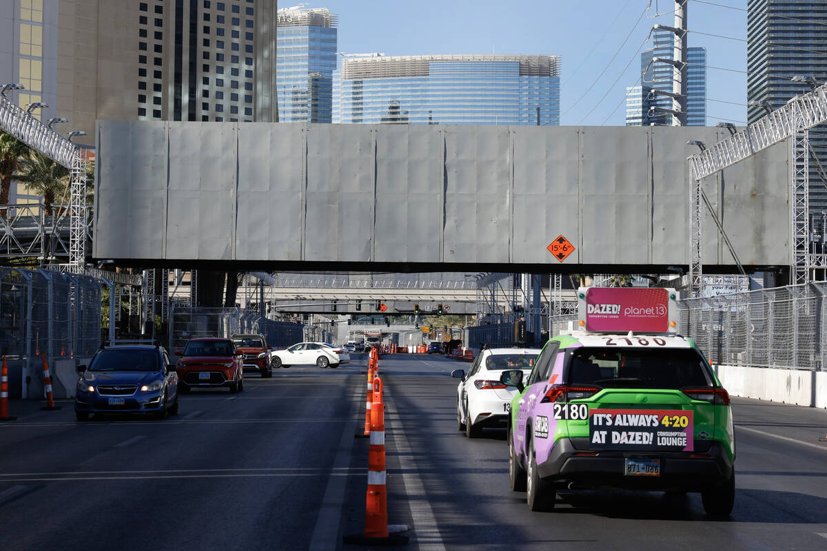 A pedestrian bridge over Harmon Avenue, part of the Formula One construction, near Koval Lane, ...