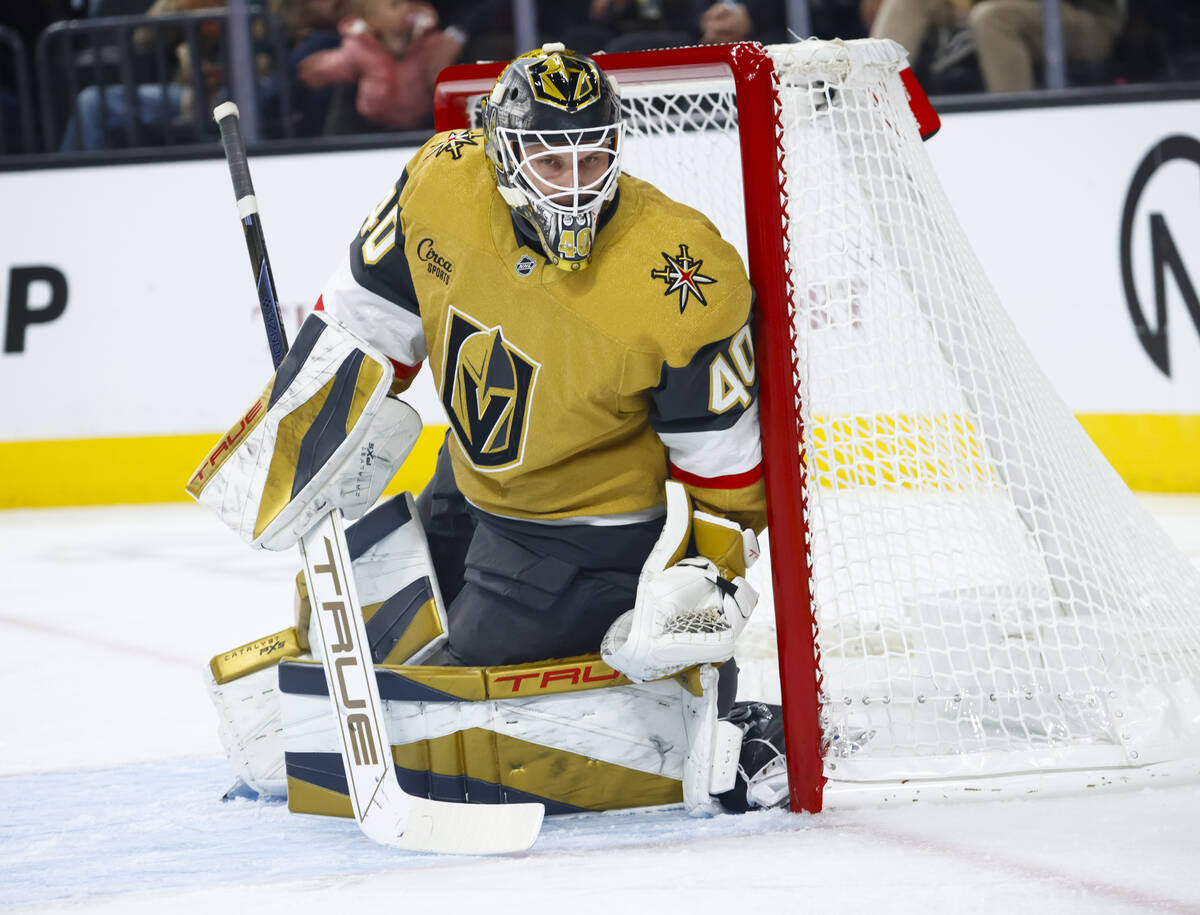 Golden Knights goaltender Akira Schmid (40) looks on during the second period of an NHL hockey ...