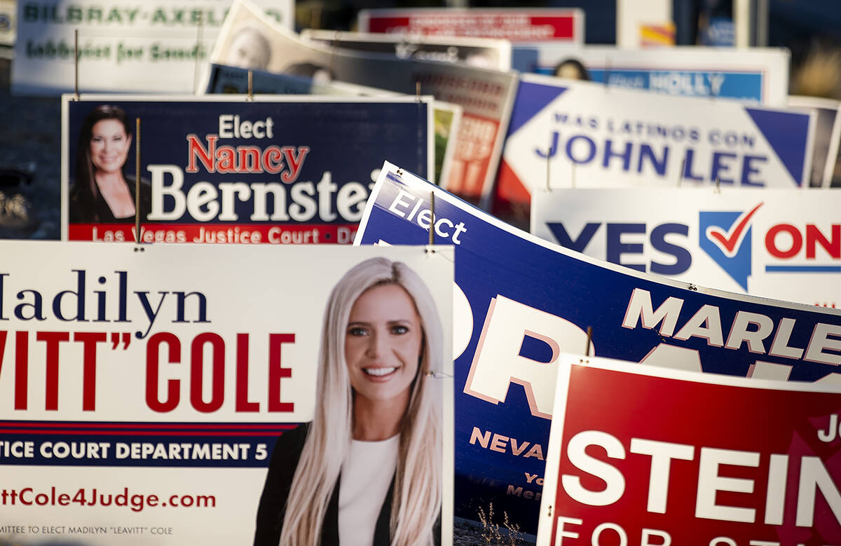 Campaign signs sit along North Hualapai Way a week after elections, Tuesday, Nov. 12, 2024, in ...