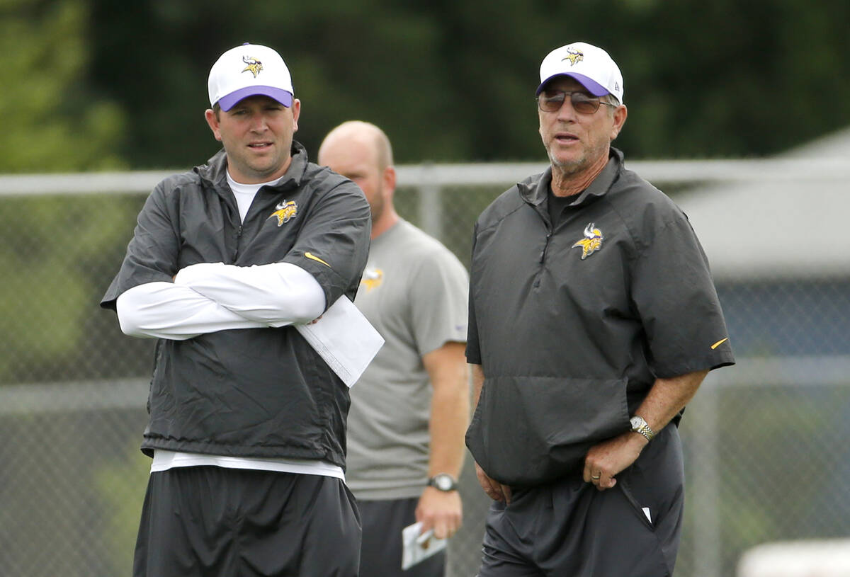 Minnesota Vikings quarterbacks coach Scott Turner, left, and his father, offensive coordinator ...