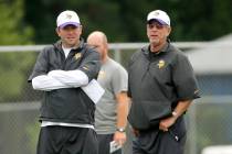 Minnesota Vikings quarterbacks coach Scott Turner, left, and his father, offensive coordinator ...