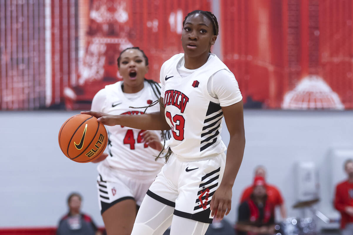 UNLV Lady Rebels guard Amarachi Kimpson (33) brings the ball up court against Loyola Marymount ...