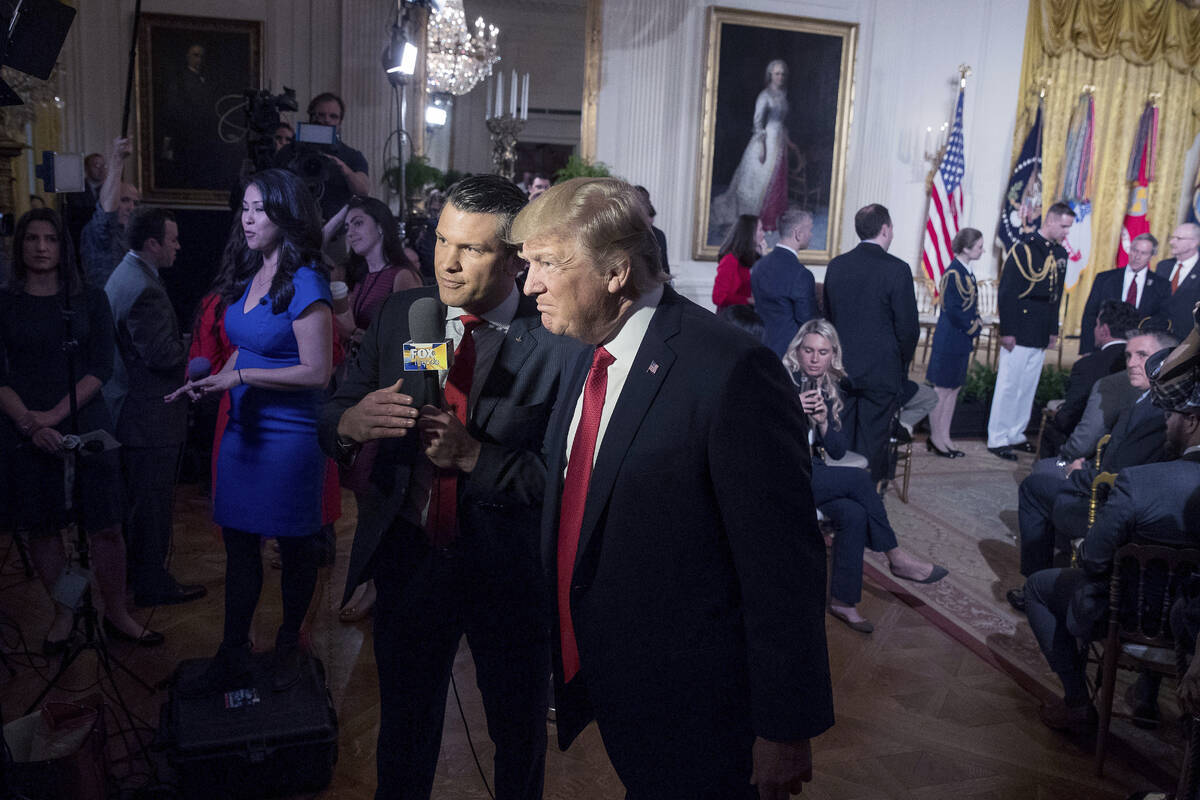 President Donald Trump appears on Fox & Friends co-host Pete Hegseth at a Wounded Warrior Proje ...