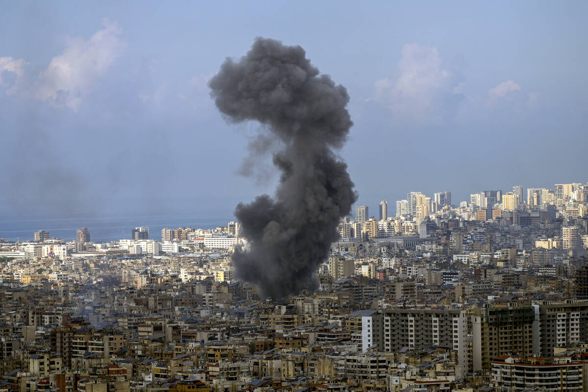 Smoke rises after an Israeli airstrike on Dahiyeh, in the southern suburb of Beirut, Lebanon, W ...