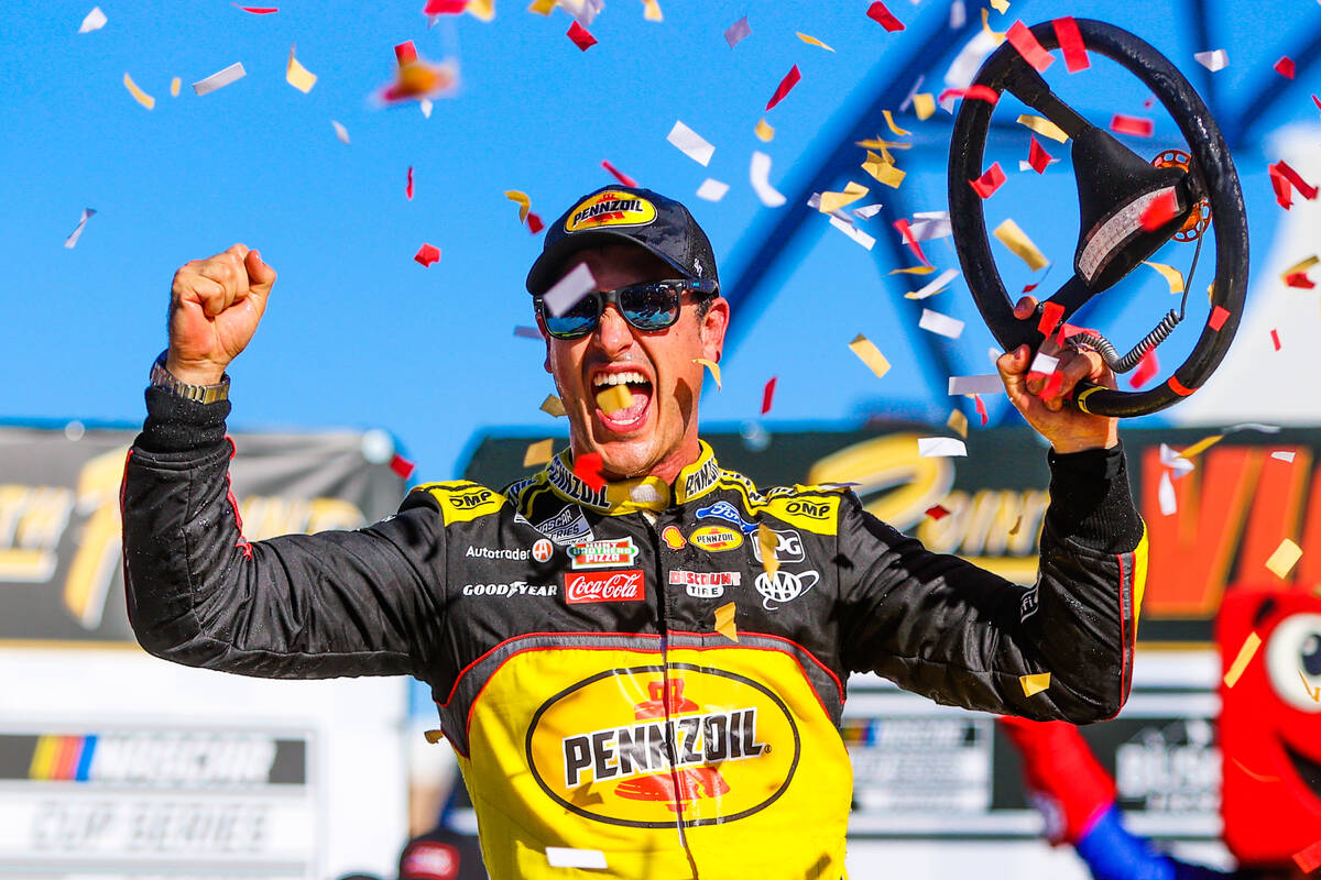 NASCAR driver Joey Logano celebrates winning the South Point 400 NASCAR Cup Series race at the ...