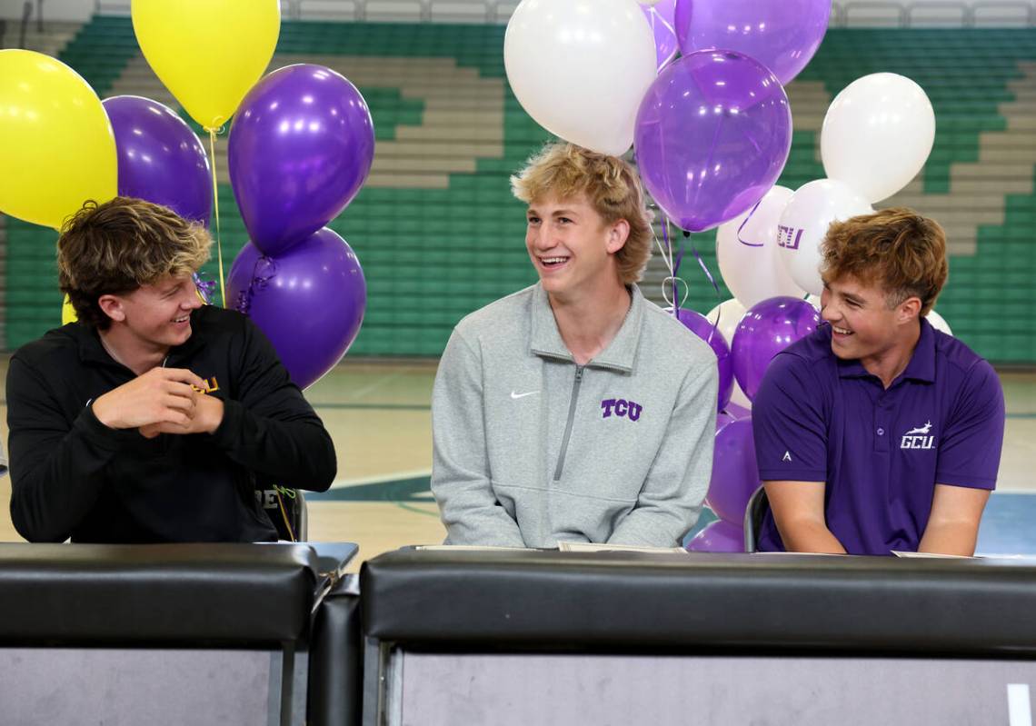 Palo Verde baseball players, from left, Ethan Clauss, Brady Dallimore and Tanner Johns prepare ...