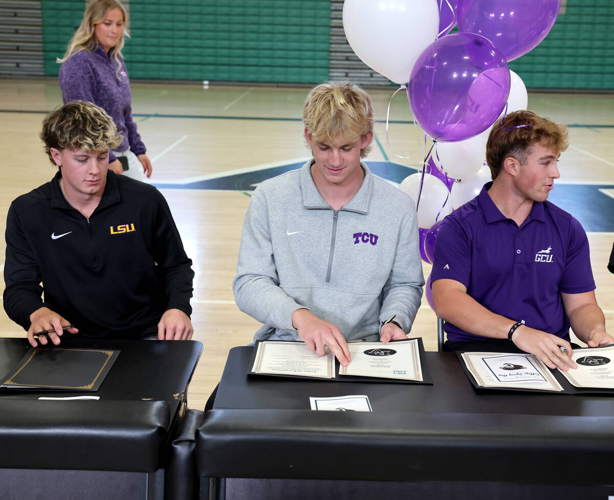 Palo Verde baseball players, from left, Ethan Clauss, Brady Dallimore and Tanner Johns prepare ...